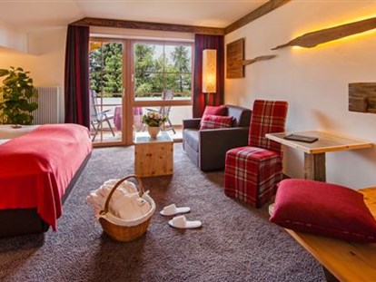 Hotels an der Piste - Hotel-Schwerpunkt: Skifahren & Kulinarik - Moos/Pass - Kaminzimmersuite - Wohlfühlhotel Falzeben
