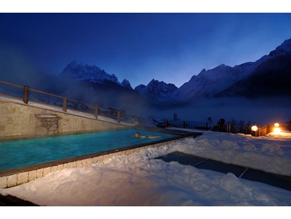 Hotels an der Piste - Wellnessbereich - Außenpool - Berghotel Sexten Dolomiten