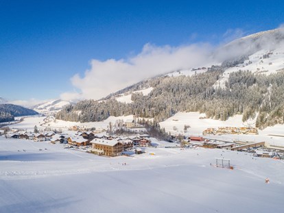 Hotels an der Piste - Skikurs direkt beim Hotel: eigene Skischule - Trentino-Südtirol - SKI IN - SKI OUT - JOAS natur.hotel.b&b
