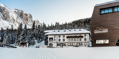 Hotels an der Piste - Parkplatz: gebührenpflichtig beim Hotel - Skigebiet Gröden - Hotel Sella - Hotel Sella Family Bike