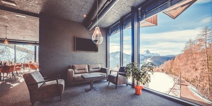 Hotels an der Piste - Skiraum: versperrbar - Bruneck - Lobby - SPACES Hotel