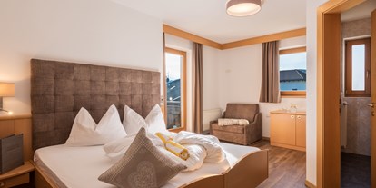 Hotels an der Piste - Pools: Innenpool - Skigebiet Gitschberg Jochtal - Zimmer Wiesenblick - Hotel Alpenfrieden