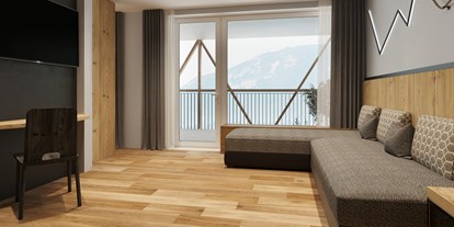 Hotels an der Piste - Skiservice: Skireparatur - Trentino-Südtirol - "Torre di Pisa" Panorama Suite Wohnbereich - Sporthotel Obereggen