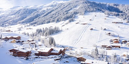 Hotels an der Piste - Klassifizierung: 4 Sterne S - Scheffau am Wilden Kaiser - Winteransicht mit Einstieg ins Skigebiet - Galtenberg Family & Wellness Resort