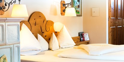 Hotels an der Piste - Wellnessbereich - Zimmer - Tirolerhof Familotel Zugspitze