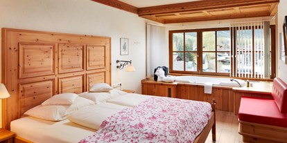 Hotels an der Piste - Klassifizierung: 4 Sterne - Skigebiet Wetterstein - Zirbensuite - Tirolerhof Familotel Zugspitze
