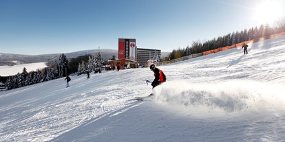 Hotels an der Piste - Skiservice: Skireparatur - Deutschland - Skipiste direkt neben dem Hotel - AHORN Hotel Am Fichtelberg