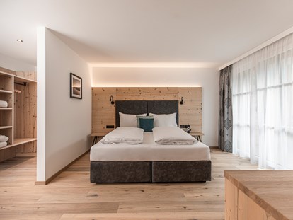 Hotels an der Piste - geführte Skitouren - Salzburg - Zimmer in der Familienlodge Emmy - Familienresort Reslwirt ****