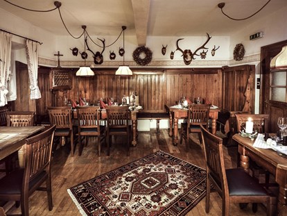 Hotels an der Piste - geführte Skitouren - Salzburg - Fonduerestaurant Ennshof - Familienresort Reslwirt ****
