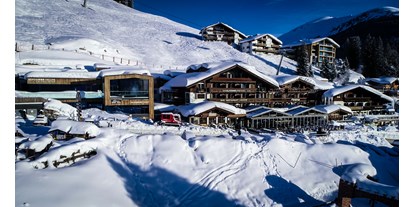 Hotels an der Piste - Skiservice: Skireparatur - das Alpenwelt Resort****SUPERIOR - MY ALPENWELT Resort****SUPERIOR