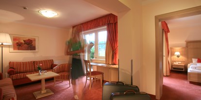 Hotels an der Piste - Skiraum: Skispinde - Mittersill - Familiensuite "Bergwelt" - Landhotel Schermer