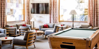 Hotels an der Piste - Skiraum: videoüberwacht - Itter - Billard - Lounge - Landhotel Schermer
