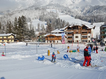 Hotels an der Piste - Skiraum: videoüberwacht - Uttendorf (Uttendorf) - Ski-Kinderland - Boutique Hotel Das Rivus