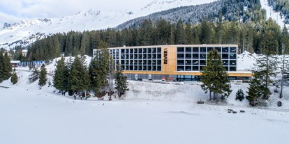 Hotels an der Piste - Parkplatz: gebührenpflichtig beim Hotel - Davos Dorf - Revier Mountain Lodge