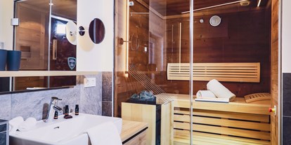 Hotels an der Piste - Verpflegung: Halbpension - Berchtesgaden - Badezimmer & Sauna | Bathroom & Sauna - Stockinggut by AvenidA | Hotel & Residences