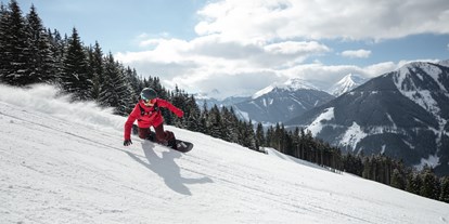 Hotels an der Piste - Skiservice: Skireparatur - Saalbach Hinterglemm - Skicircus Saalbach Hinterglemm Leogang Fieberbrunn - Ski & Bike Hotel Wiesenegg