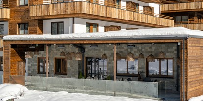 Hotels an der Piste - Langlaufloipe - Saalbach Hinterglemm - Sonnenterrasse im Winter - Ski & Bike Hotel Wiesenegg