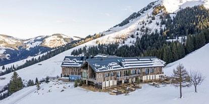 Hotels an der Piste - geführte Skitouren - Söll - Die KRAFTalm  und liegt mitten in der SkiWelt Wilder Kaiser - Brixental direkt an der Mittelstation der neuen 10er Gondelbahn Salvistabahn - KRAFTalm