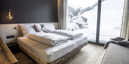 Hotels an der Piste - Hotel-Schwerpunkt: Skifahren & Romantik - Die KRAFTalm liegt mitten in der SkiWelt Wilder Kaiser - Brixental direkt an der Mittelstation der neuen 10er Gondelbahn Salvistabahn - KRAFTalm