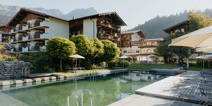 Hotels an der Piste - Hotel-Schwerpunkt: Skifahren & Familie - Itter - Hotel Kaiser in Tirol | Naturbadeteich - Hotel Kaiser in Tirol