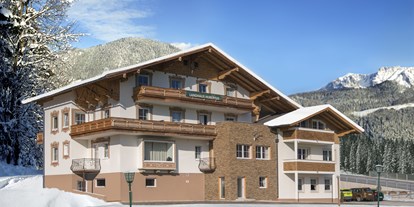 Hotels an der Piste - Hotel-Schwerpunkt: Skifahren & Tourengehen - Wagrain - Aussenansicht - Landhaus Hubertus