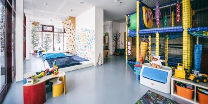 Hotels an der Piste - Suite mit offenem Kamin - Lech - Kinderspielzimmer - Kinderbetreuung ab 3 Jahre 5 Tage pro Woche - Hotel Warther Hof
