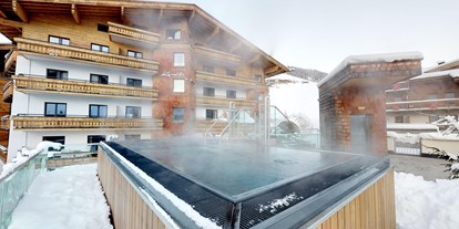 Hotels an der Piste - Skiraum: Skispinde - Panorama Whirlpool - Hotel Kendler