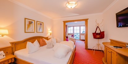 Hotels an der Piste - Skiraum: Skispinde - Doppelzimmer Deluxe - Hotel Salzburger Hof Zauchensee