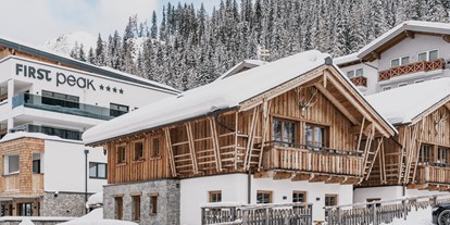 Hotels an der Piste - Ski-In Ski-Out - Skigebiet Zauchensee-Flachauwinkl - Außenansicht FIRSTpeak & Chalets - FIRSTpeak Zauchensee