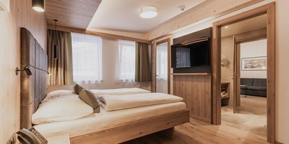 Hotels an der Piste - Skiservice: vorhanden - Salzburg - Schlafzimmer Junior Suite - FIRSTpeak Zauchensee