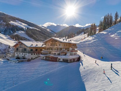 Hotels an der Piste - Hotel-Schwerpunkt: Skifahren & Ruhe - Bramberg am Wildkogel - Ferienwohnungen in Saalbach-Hinterglemm - direkt an der Skipiste! Ski-In & Ski-Out am 12erKogel - Ferienwohnungen Perfeldhof
