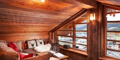 Hotels an der Piste - Ski-In Ski-Out - Dienten am Hochkönig - Kuschelecke und Chill-Lounge - Almdorf Flachau