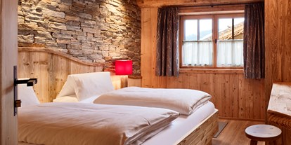 Hotels an der Piste - Hotel-Schwerpunkt: Skifahren & Ruhe - Pongau - Schlafzimmer mit Doppelbett - Promi Alm Flachau