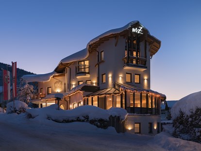 Hotels an der Piste - Kinder-/Übungshang - Skigebiet Filzmoos - Abendstimmung  - meiZeit Lodge
