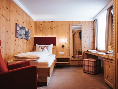 Hotels an der Piste - Suite mit offenem Kamin - Katschberghöhe - Einzelzimmer Zirbe - Hotel Schneider ****superior