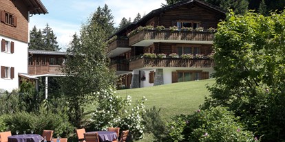 Hotels an der Piste - Hotel-Schwerpunkt: Skifahren & Ruhe - Flims Waldhaus - Gartenterrasse - Hotel Dieschen