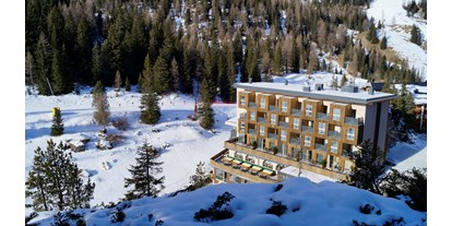 Hotels an der Piste - Skiraum: versperrbar - Skiregion Alta Badia - Hotel - Bar - Restaurant 
Passo Campolongo - Sports&Nature Hotel Boè
