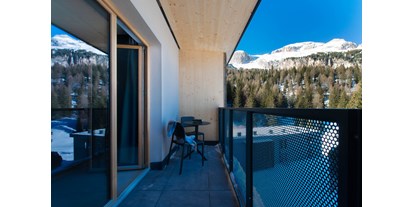 Hotels an der Piste - Parkplatz: gebührenpflichtig in Gehweite - Wolkenstein/Gröden -  Balkon Deluxe Zimmer - Sports&Nature Hotel Boè