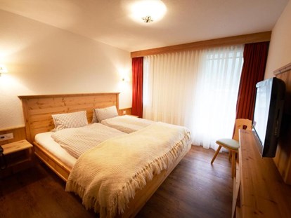 Hotels an der Piste - Preisniveau: moderat - Grächen - Panorama Suite - Schlafzimmer - Hotel Bristol *** Saas-Fee