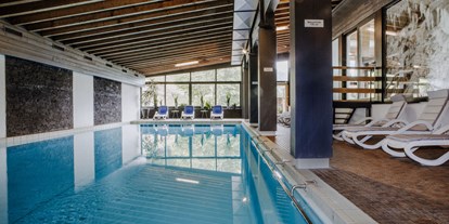 Hotels an der Piste - Sauna - Damüls - Entspannte Stunden im hauseigenen Hallenbad - Bio-Berghotel Ifenblick
