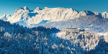 Hotels an der Piste - Suite mit offenem Kamin - Schönau am Königssee - Kempinski Hotel Berchtesgaden im Winter - Kempinski Hotel Berchtesgaden