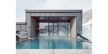 Hotels an der Piste - Pools: Infinity Pool - Dorfgastein - Aparthotel JoAnn suites & apartments