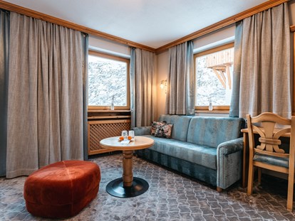 Hotels an der Piste - Sonnenterrasse - Deluxe Maiensee Zimmer (35m2). Bis zu 6 Zimmer können verbunden werden, ideal für Familien - Hotel Maiensee