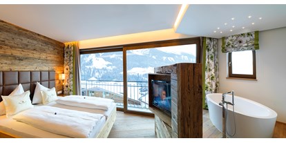 Hotels an der Piste - Hotel-Schwerpunkt: Skifahren & Romantik - Panoramasuite deluxe - Aktivhotel Alpendorf