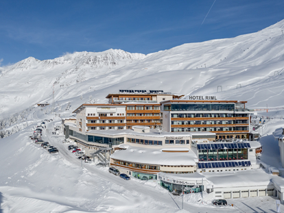 Hotels an der Piste - Hotel-Schwerpunkt: Skifahren & Kulinarik - Moos/Pass - Frontaufnahme Hotel - SKI | GOLF | WELLNESS Hotel Riml ****s