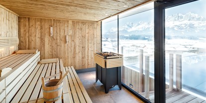 Hotels an der Piste - Skiraum: videoüberwacht - SkiStar St. Johann in Tirol - Panorama Familien-Textil-Sauna - Hotel Penzinghof