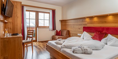 Hotels an der Piste - Skiraum: Skispinde - Doppelzimmer Enzian - Felsner's Hotel & Restaurant