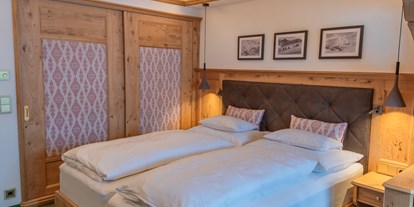 Hotels an der Piste - Skiraum: Skispinde - Galtür - Doppelzimmer mit Boxspringbett - Hotel Ulli