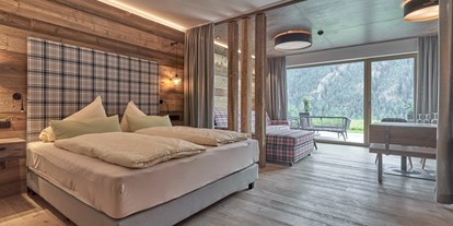 Hotels an der Piste - Hotel-Schwerpunkt: Skifahren & Party - Moos/Pass - Schlafzimmer und Aufenthaltsraum Ferienwohnung - The Peak Sölden