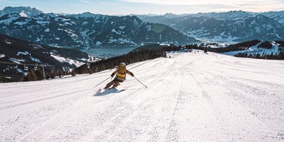 Hotels an der Piste - Skiraum: Skispinde - Skifahren auf der Zeller Schmittenhöhe mit Seeblick - Hotel Sonnblick
